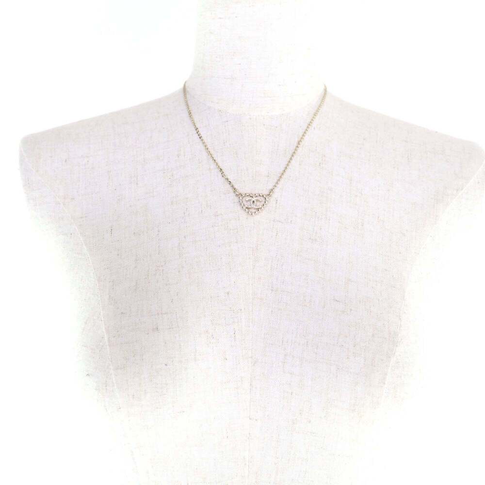 CHANEL Gold Logo Necklace - Picture 4 of 8